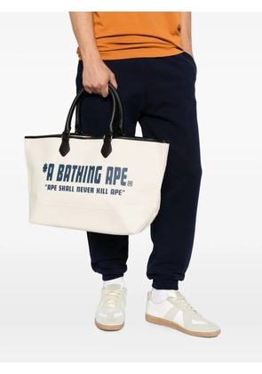 A BATHING APE® logo-print tote bag - Neutrals