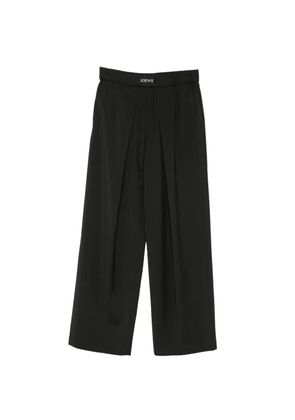 LOEWE logo-patch pleated trousers - Black