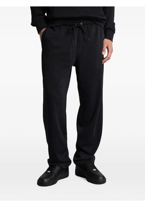 Nike logo-embroidered drawstring track pants - Black
