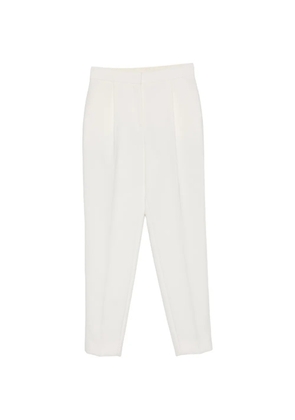 Moschino pleated tapered trousers - Neutrals