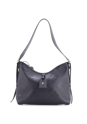 Louis Vuitton Pre-Owned CarryAll Monogram Empreinte Giant PM hobo bag - Black