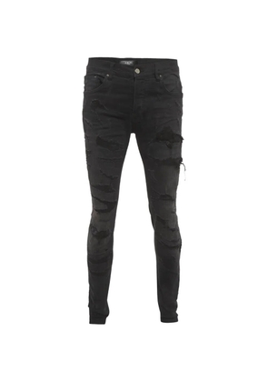 AMIRI distressed denim jeans - Black