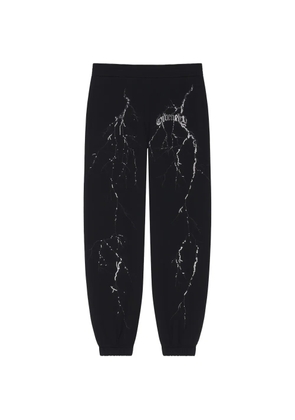 Givenchy crystal-embellished lightning-print track pants - Black