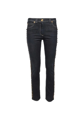 Versace Pre-Owned studded slim-fit jeans - Black