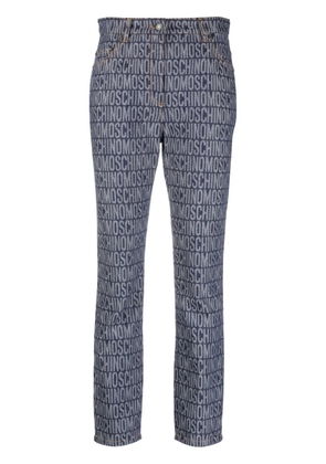 Moschino logo-jacquard high-rise slim-cut jeans - Blue