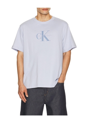 Calvin Klein 20's Short Sleeve Hero Monologo Tee in Blue. Size S. Also in L.