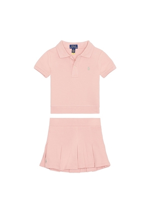 Polo Ralph Lauren Kids Short Sleeve Stretch Mesh Collared Shirt With Pleated Skirt in Rose. Size 6. Also in 2, 3, 4.