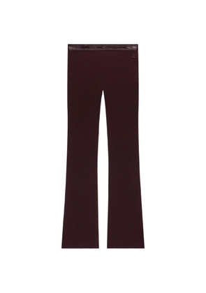 Courrèges vinyl-trimmed ribbed-knit trousers - Purple