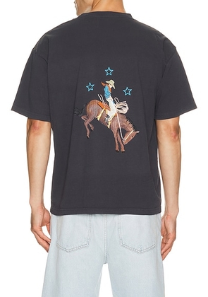 Remington Stone Cowboy 2 Tee in Black - Black. Size L (also in S, M, XL/1X, XXL/2X).