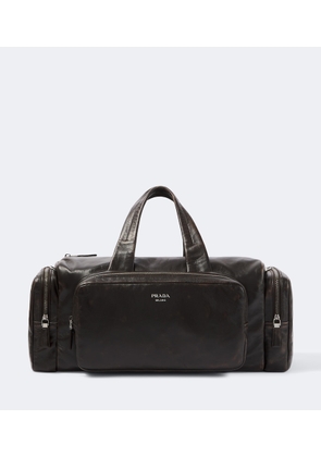 Prada Distressed leather duffel bag