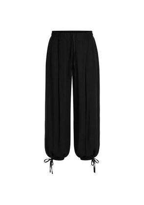La Haine Inside Us drawstring-fastening tie-cuff trousers - Black