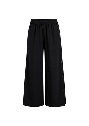 Arlo Mott Baxter side-buttons trousers - Black