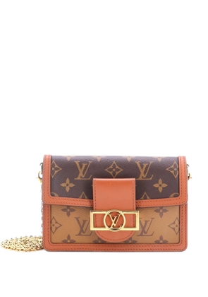 Louis Vuitton Pre-Owned Dauphine Chain Wallet Reverse Monogram Canvas clutch bag - Brown