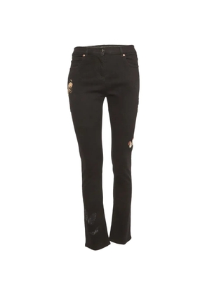 Valentino Garavani Pre-Owned butterfly-appliqué slim-fit jeans - Black