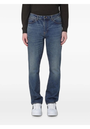 Emporio Armani whiskering-effect slim-cut jeans - Blue