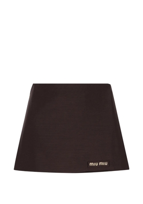 Miu Miu logo-patch wrap skirt - Brown