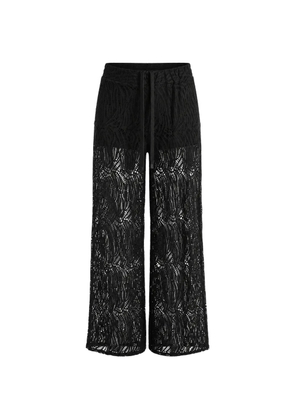 La Haine Inside Us lace-pattern palazzo pants - Black