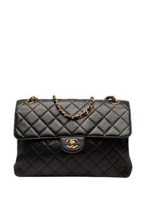 CHANEL Pre-Owned 1996-1997 Jumbo Quilted Lambskin Double Sided Flap shoulder bag - Black