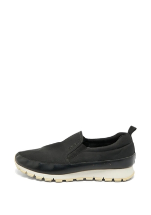Prada Pre-Owned debossed-logo sneakers - Black
