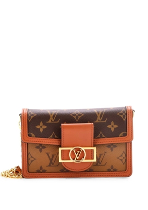 Louis Vuitton Pre-Owned Dauphine Chain Wallet Reverse Monogram Canvas clutch bag - Brown