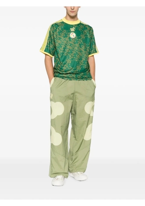 PUMA x Côte d'Ivoire x Salehe Bembury King patterned track pants - Green