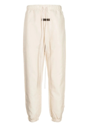 FEAR OF GOD ESSENTIALS logo-tag drawstring track pants - Neutrals