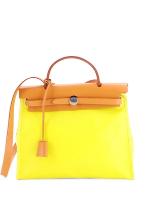 Hermès Pre-Owned Herbag Zip Berline Vache Canvas and Leather 31 shoulder bag - Yellow