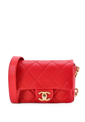 CHANEL Pre-Owned Twist Your Buttons Flap Bag Quilted Caviar Mini crossbody bag - Red