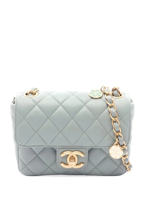 CHANEL Pre-Owned 2021-2026 Mini Square Lambskin Casino Royale Charms Single Flap crossbody bag - Blue