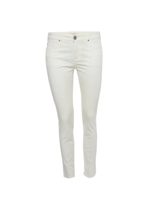 Versace Pre-Owned Medusa studded slim-fit jeans - Neutrals
