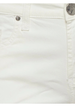 Versace Pre-Owned Medusa studded slim-fit jeans - Neutrals