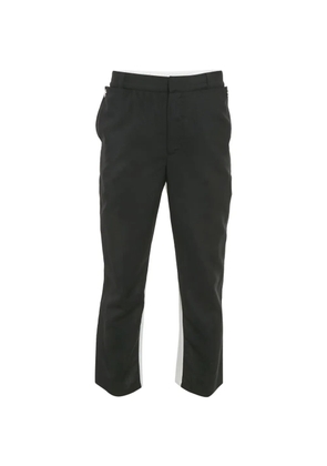 Burberry Pre-Owned logo-print paneled trousers - Black