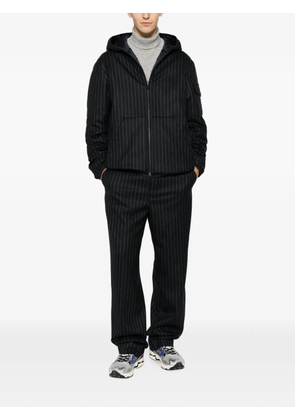 Moncler pinstripe-pattern trousers - Blue