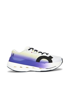 On Cloudboom Max in White & Juniper - Purple. Size 10.5 (also in 7, 7.5, 8, 8.5, 9, 9.5, 10, 11, 11.5, 12, 13).