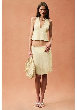 L'Academie for FWRD Zella Midi Skirt in Butter Yellow - Yellow. Size L (also in S, XXS, XS, M, XL).