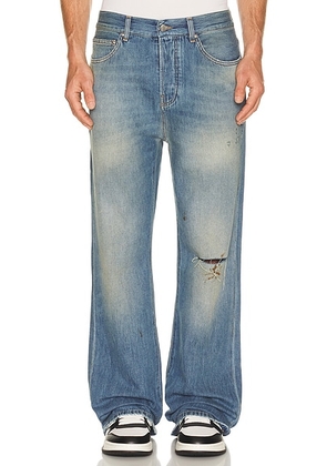 Amiri Slash Bootcut Jean in Desert Sky - Blue. Size 30 (also in 34, 36, 38, 31, 32, 33).
