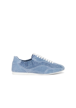 SIMKHAI Georgie Elasticized Denim Leather Sneaker in Denim-Light. Size 36. Also in 37, 38, 39, 40, 41.