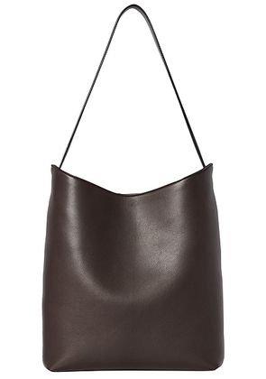 The Row Alma Shoulder Bag in Dark Brown ANS - Brown. Size all.