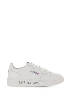 Autry Medalist slogan-print leather sneakers - White