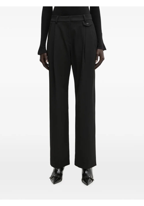 WRSTBHVR Dorea logo-plaque pleated trousers - Black