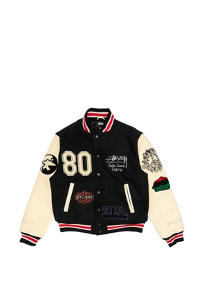 Denim Tears x Stüssy x Our Legacy patch-detail varsity jacket - Black