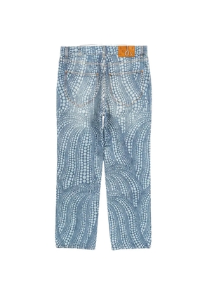 Louis Vuitton Pre-Owned 1910s pumpkin print denim trousers - Blue