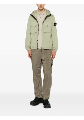 Stone Island logo-patch piqué polo shirt - Green