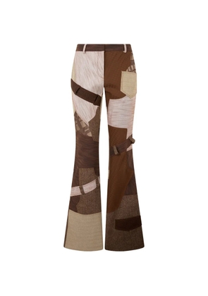 Moschino abstract-pattern palazzo pants - Brown