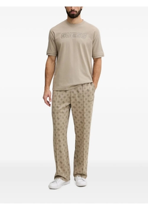 GUESS USA monogram-print track pants - Neutrals