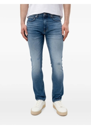 HUGO distressed logo-patch jeans - Blue