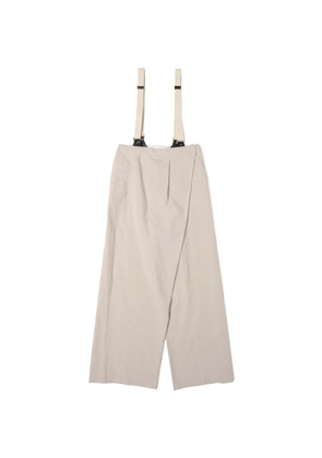 Muller Of Yoshiokubo wrap-front suspender trousers - Neutrals