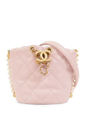 CHANEL Pre-Owned mini quilted CC drawstring bucket bag - Pink