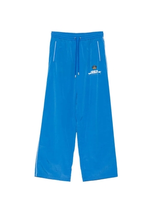 Off-White logo-printed track pants - Blue