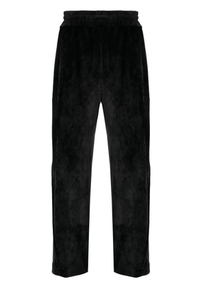 GCDS logo-embroidered velvet trousers - Black